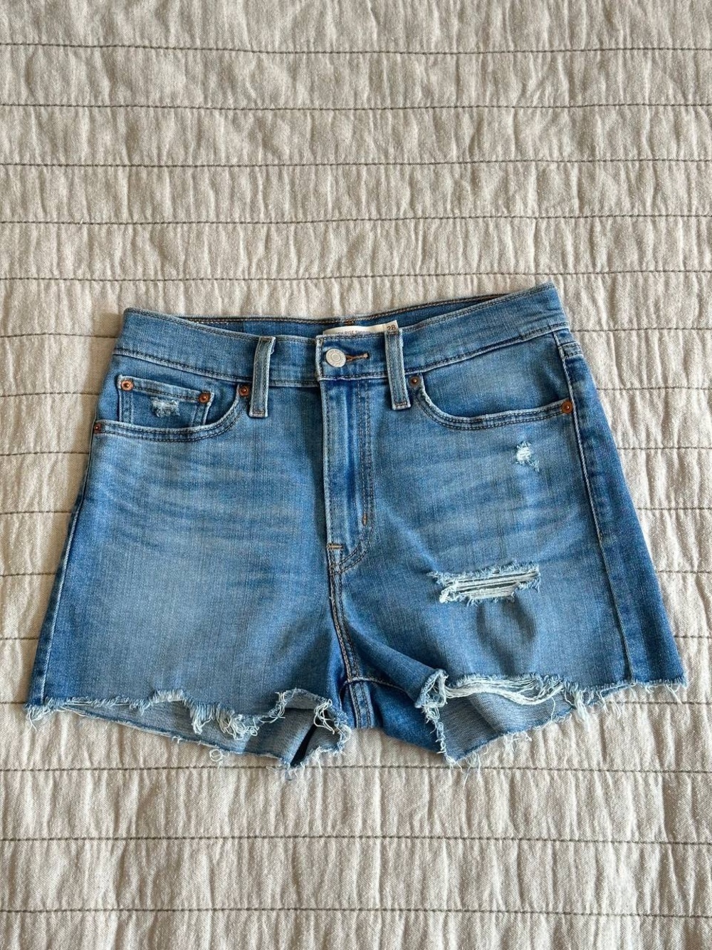 Levi's Light Blue Distressed Denim Shorts